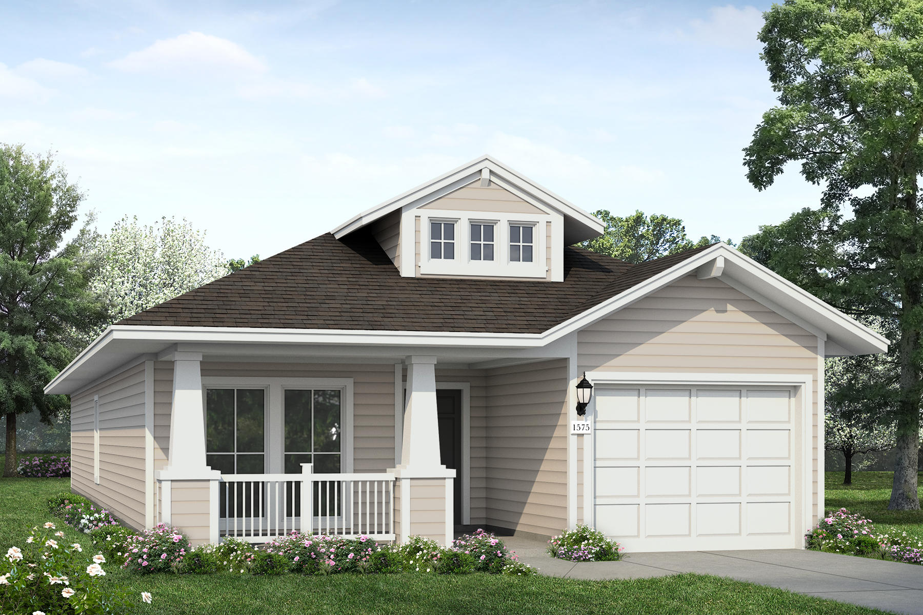 Exterior of tan one-story home with a white garage and green landscaping.